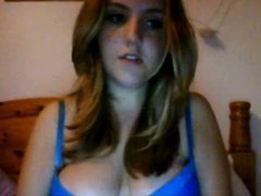Busty chick plays with her boobs
